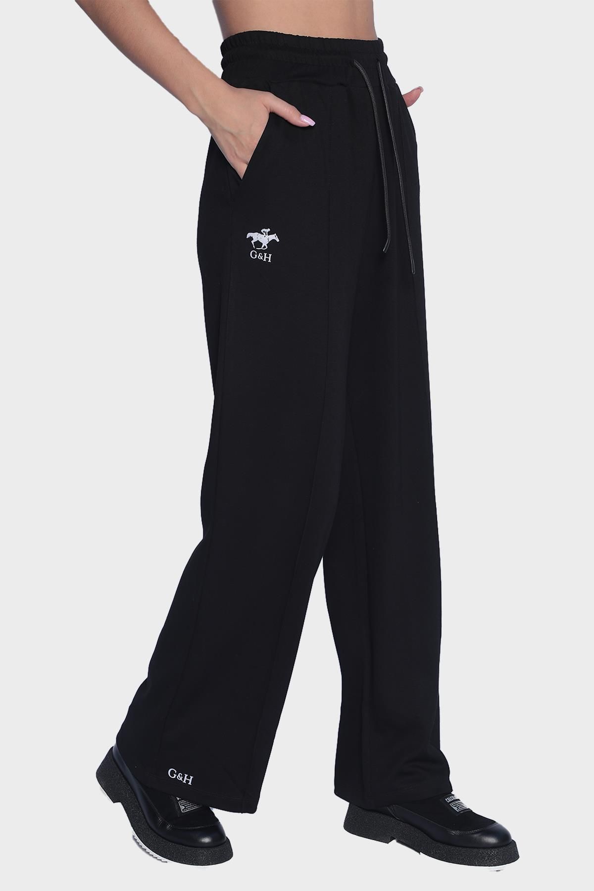 Женские спортивные штаны с широким карманом на эластичной талии - Черный
